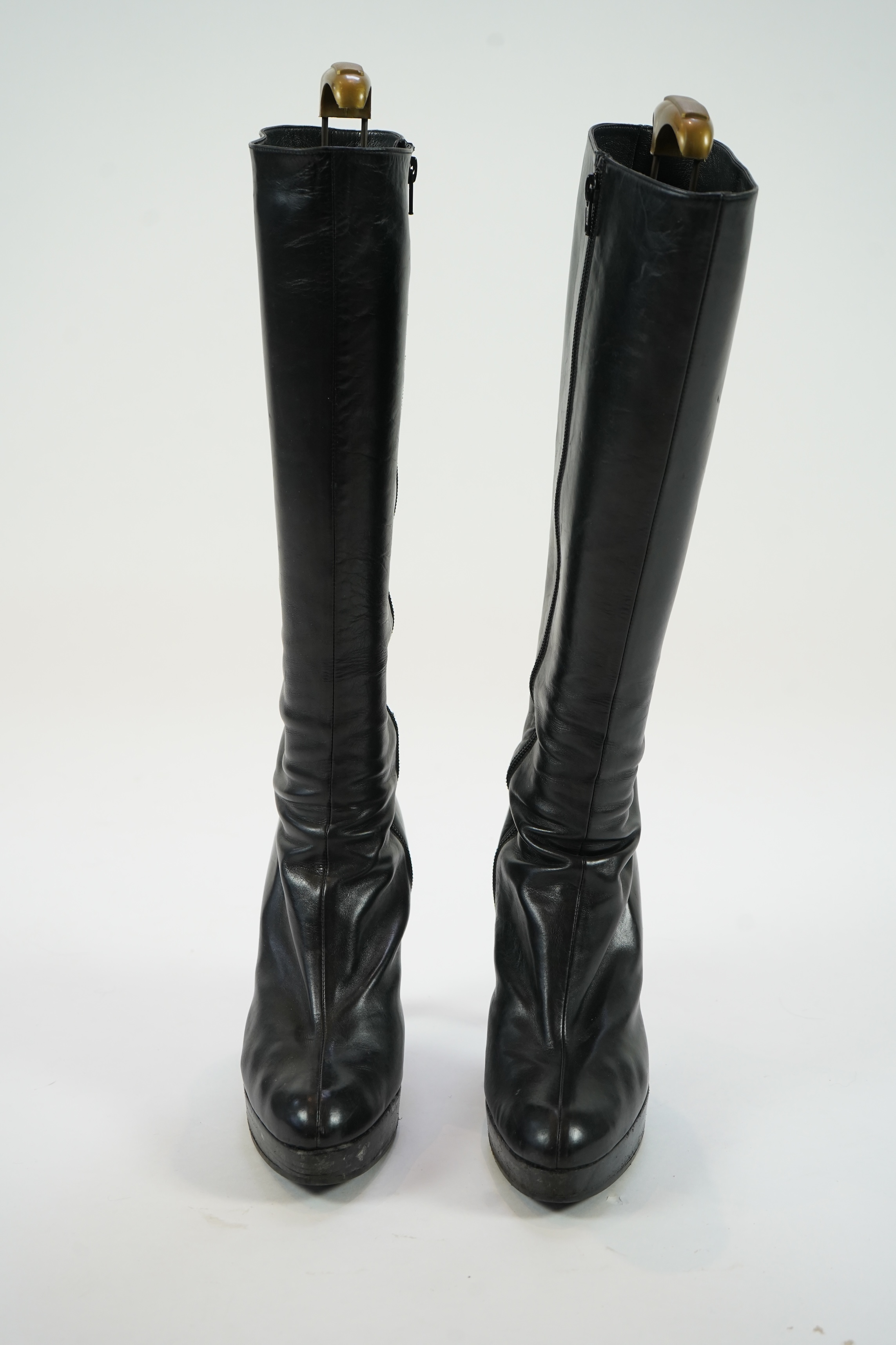 A pair of lady's Prada black leather boots and a pair of Russell & Bromley platform black leather knee high boots. size EU 40 (approx UK size 7.5)